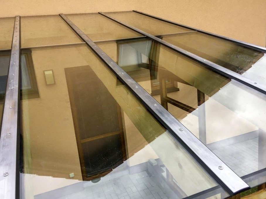 pose de verrière veranda